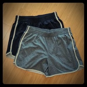Two pairs of Champion C9 athletic shorts